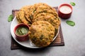 Palak Poori or spinach puri served with chutney, Indian food